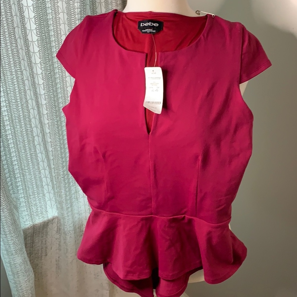 Bebe NWT peplum berry ponte top large